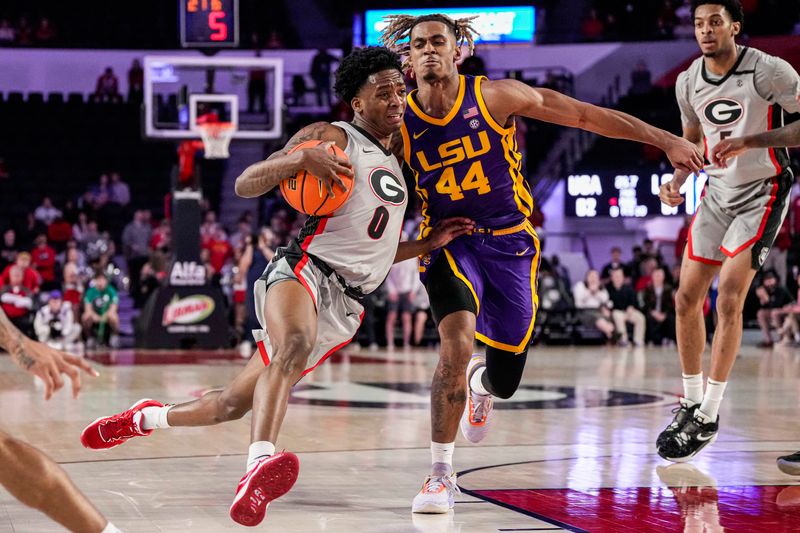 Feb 14, 2023; Athens, Georgia, USA; Georgia Bulldogs guard Terry Roberts (0) tries to get past LSU Tigers guard Adam Miller (44) during the second half at Stegeman Coliseum. Mandatory Credit: Dale Zanine-USA TODAY Sports