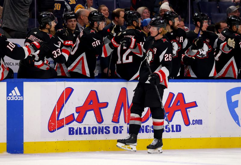 Jan 18, 2024; Buffalo, New York, USA;  Buffalo Sabres defenseman Rasmus Dahlin (26) celebrates his goal with teammates during the third period against the Chicago Blackhawks at KeyBank Center. Mandatory Credit: Timothy T. Ludwig-USA TODAY Sports