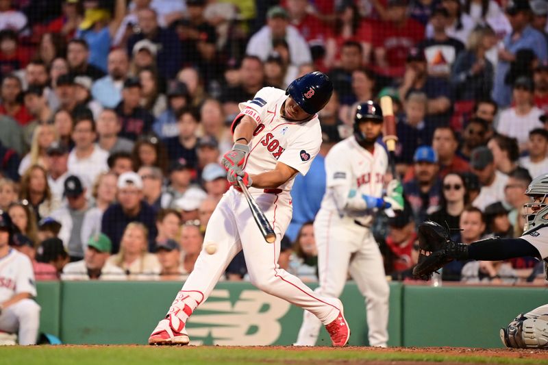 Jun 16, 2024; Boston, Massachusetts, USA; Boston Red Sox center fielder Ceddanne Rafaela (43) hits a single against the New York Yankees during the fourth inning at Fenway Park. Mandatory Credit: Eric Canha-USA TODAY Sports