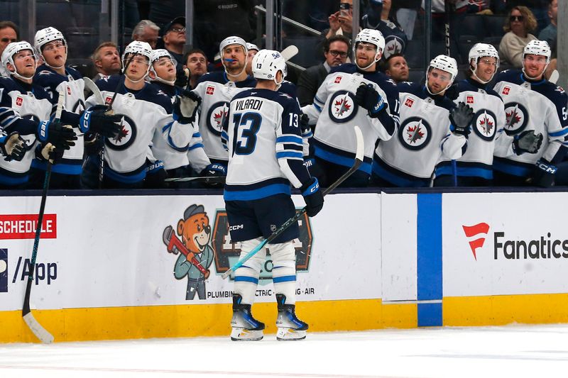 Nov 1, 2024; Columbus, Ohio, USA; Winnipeg Jets center Gabriel Vilardi (13) celebrates his goal against the Columbus Blue Jackets during the third period at Nationwide Arena. Mandatory Credit: Russell LaBounty-Imagn Images