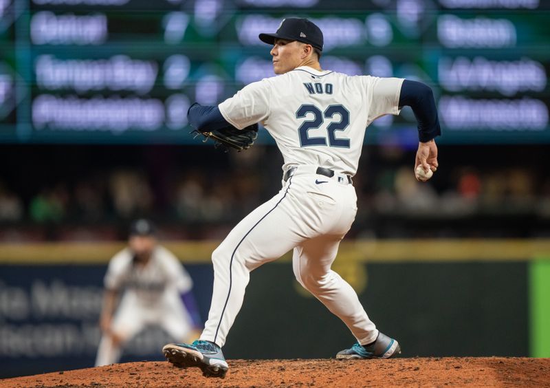 Sep 11, 2024; Seattle, Washington, USA;  Seattle Mariners starter Bryan Woo (22) delivers a pitch during the seventh inning against the San Diego Padres at T-Mobile Park. Mandatory Credit: Stephen Brashear-Imagn Images