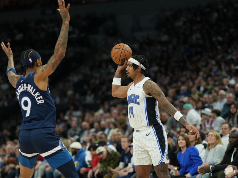 MINNEAPOLIS, MN -  FEBRUARY 2: Gary Harris #14 of the Orlando Magic passes the ball during the game against the Minnesota Timberwolves on February 2, 2024 at Target Center in Minneapolis, Minnesota. NOTE TO USER: User expressly acknowledges and agrees that, by downloading and or using this Photograph, user is consenting to the terms and conditions of the Getty Images License Agreement. Mandatory Copyright Notice: Copyright 2024 NBAE (Photo by Jordan Johnson/NBAE via Getty Images)