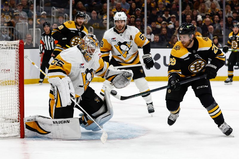 Nov 29, 2024; Boston, Massachusetts, USA; Boston Bruins center Elias Lindholm (28) goes for a rebound off a save by Pittsburgh Penguins goaltender Tristan Jarry (35) during the third period at TD Garden. Mandatory Credit: Winslow Townson-Imagn Images