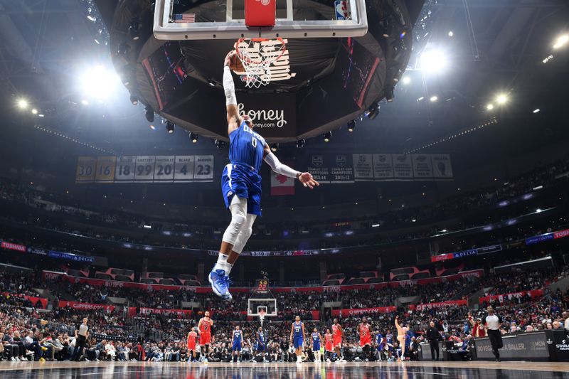 LOS ANGELES, CA - MARCH 27: Russell Westbrook  #0 of the LA Clippers drives to the basket during the game against the Chicago Bulls on March 27, 2023 at Crypto.Com Arena in Los Angeles, California. NOTE TO USER: User expressly acknowledges and agrees that, by downloading and/or using this Photograph, user is consenting to the terms and conditions of the Getty Images License Agreement. Mandatory Copyright Notice: Copyright 2023 NBAE (Photo by Adam Pantozzi/NBAE via Getty Images)