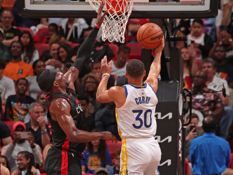 MIAMI, FL - MARCH 26: Stephen Curry #30 of the Golden State Warriors shoots the ball during the game against the Miami Heat on March 26, 2024 at Kaseya Center in Miami, Florida. NOTE TO USER: User expressly acknowledges and agrees that, by downloading and or using this Photograph, user is consenting to the terms and conditions of the Getty Images License Agreement. Mandatory Copyright Notice: Copyright 2024 NBAE (Photo by Issac Baldizon/NBAE via Getty Images)