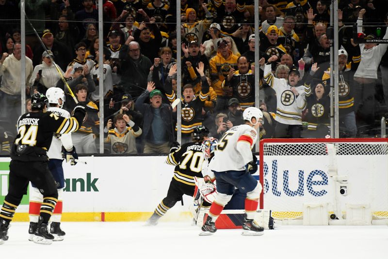 Apr 6, 2024; Boston, Massachusetts, USA; Boston Bruins center Jesper Boqvist (70) scores an overtime winning goal past Florida Panthers goaltender Sergei Bobrovsky (72) at TD Garden. Mandatory Credit: Bob DeChiara-USA TODAY Sports