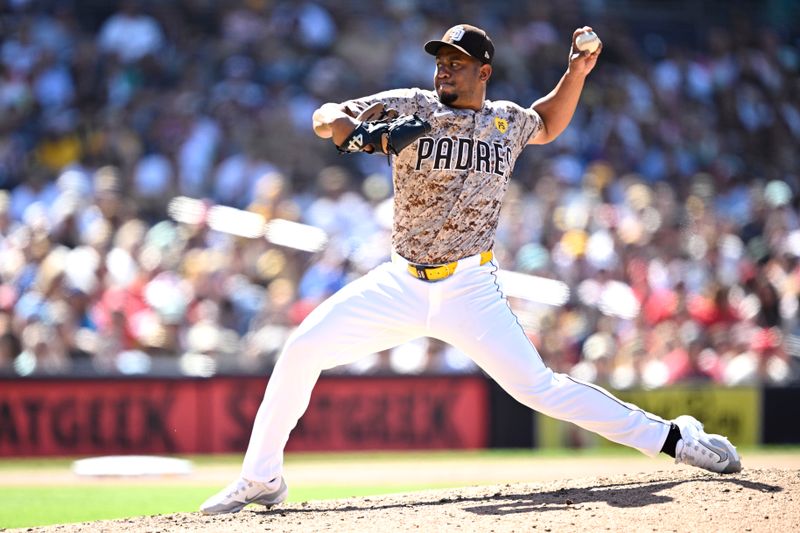 Apr 28, 2024; San Diego, California, USA; San Diego Padres relief pitcher Wandy Peralta (58) throws a pitch against the Philadelphia Phillies during the eighth inning at Petco Park. Mandatory Credit: Orlando Ramirez-USA TODAY Sports