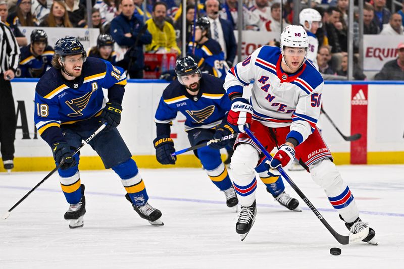 Jan 11, 2024; St. Louis, Missouri, USA;  New York Rangers left wing Will Cuylle (50) controls the puck against the St. Louis Blues during the third period at Enterprise Center. Mandatory Credit: Jeff Curry-USA TODAY Sports