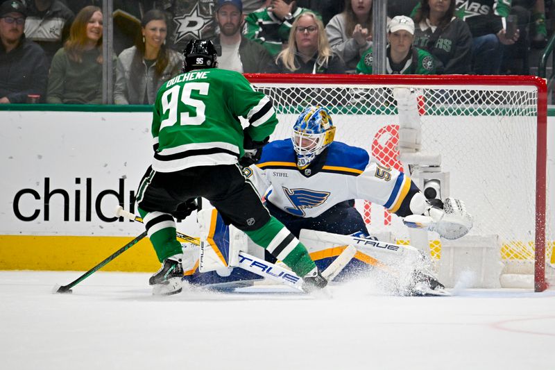 Apr 17, 2024; Dallas, Texas, USA; St. Louis Blues goaltender Jordan Binnington (50) stops a shot by Dallas Stars center Matt Duchene (95) during the overtime shootout at the American Airlines Center. Mandatory Credit: Jerome Miron-USA TODAY Sports