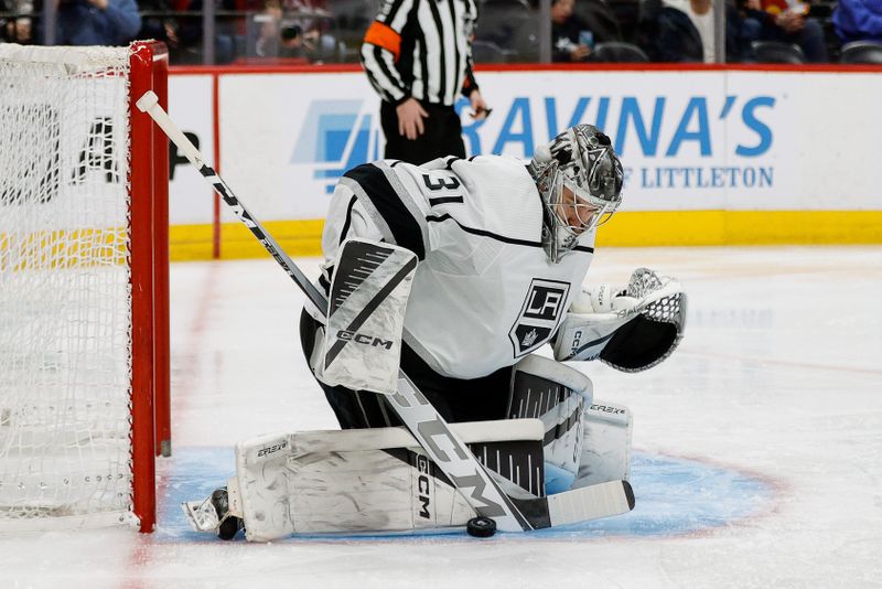 Jan 26, 2024; Denver, Colorado, USA; Los Angeles Kings goaltender David Rittich (31) makes a save in the second period against the Colorado Avalanche at Ball Arena. Mandatory Credit: Isaiah J. Downing-USA TODAY Sports