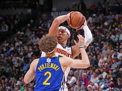 DENVER, CO - DECEMBER 25: Aaron Gordon #50 of the Denver Nuggets looks to pass the ball during the game against the Golden State Warriors on December 25, 2023 at the Ball Arena in Denver, Colorado. NOTE TO USER: User expressly acknowledges and agrees that, by downloading and/or using this Photograph, user is consenting to the terms and conditions of the Getty Images License Agreement. Mandatory Copyright Notice: Copyright 2023 NBAE (Photo by Garrett Ellwood/NBAE via Getty Images)