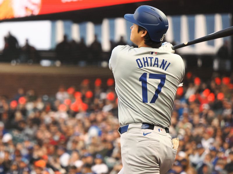 May 14, 2024; San Francisco, California, USA; Los Angeles Dodgers designated hitter Shohei Ohtani (17) hits a solo home run against the San Francisco Giants during the fourth inning at Oracle Park. Mandatory Credit: Kelley L Cox-USA TODAY Sports