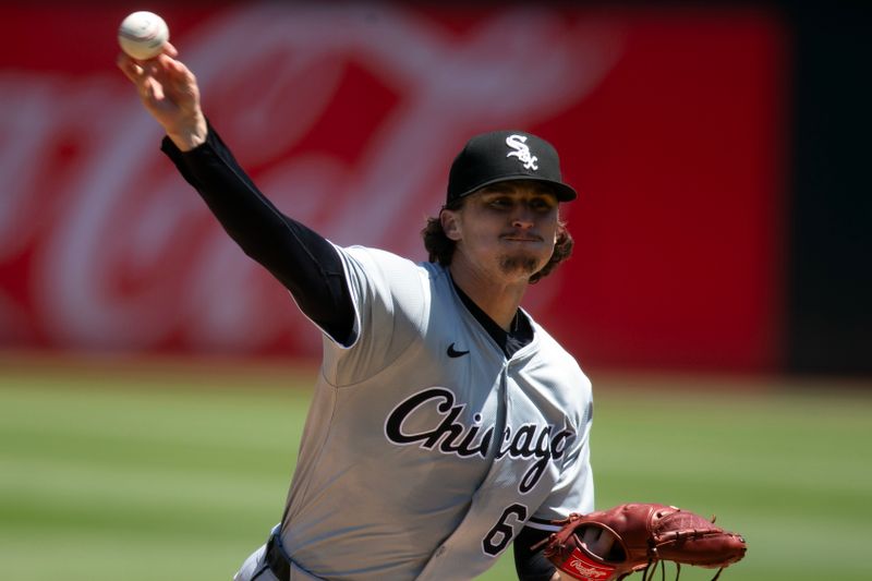 Aug 7, 2024; Oakland, California, USA; Chicago White Sox starting pitcher Davis Martin (65) delivers against the Oakland Athletics during the second inning at Oakland-Alameda County Coliseum. Mandatory Credit: D. Ross Cameron-USA TODAY Sports