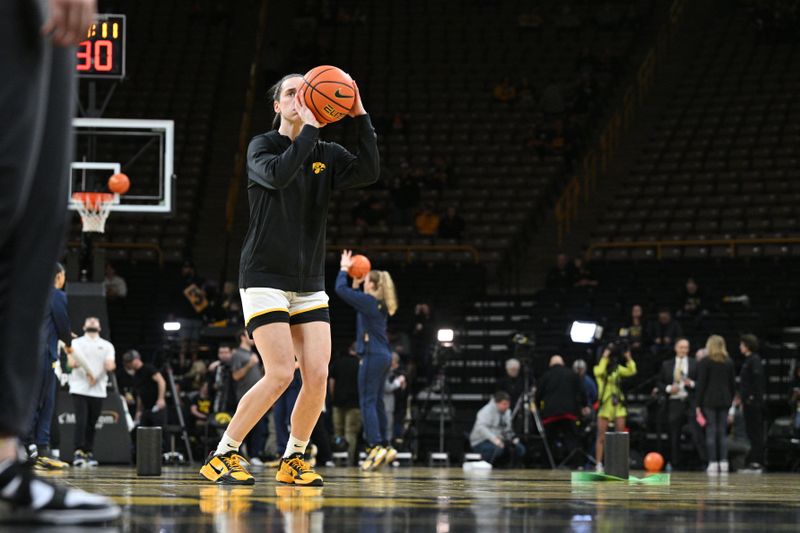 Feb 15, 2024; Iowa City, Iowa, USA; Iowa Hawkeyes guard Caitlin Clark (22) warms up before the game against the Michigan Wolverines at Carver-Hawkeye Arena. Mandatory Credit: Jeffrey Becker-USA TODAY Sports