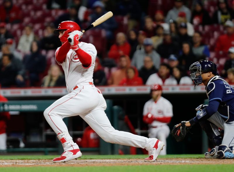 Apr 17, 2023; Cincinnati, Ohio, USA; Cincinnati Reds catcher Tyler Stephenson (37) hits an RBI single against the Tampa Bay Rays during the seventh inning at Great American Ball Park. Mandatory Credit: David Kohl-USA TODAY Sports