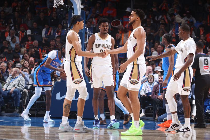 OKLAHOMA CITY, OK - NOVEMBER 13: Brandon Boston Jr. #11 and Jeremiah Robinson-Earl #50 of the New Orleans Pelicans high five during the game against the Oklahoma City Thunder on November 13, 2024 at Paycom Center in Oklahoma City, Oklahoma. NOTE TO USER: User expressly acknowledges and agrees that, by downloading and or using this photograph, User is consenting to the terms and conditions of the Getty Images License Agreement. Mandatory Copyright Notice: Copyright 2024 NBAE (Photo by Nathaniel S. Butler/NBAE via Getty Images)