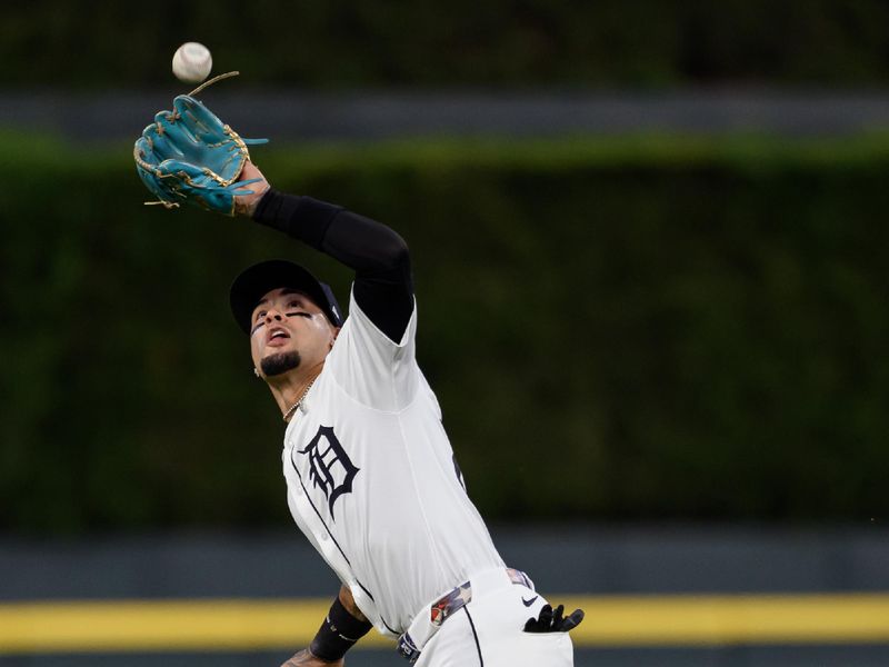 Jun 29, 2025; Detroit, Michigan, USA; Detroit Tigers shortstop Javier Báez (28) catches a soft line drive in shallow left field against the Minnesota Twins in the eighth inning at Comerica Park. Mandatory Credit: Lon Horwedel-Imagn Images
