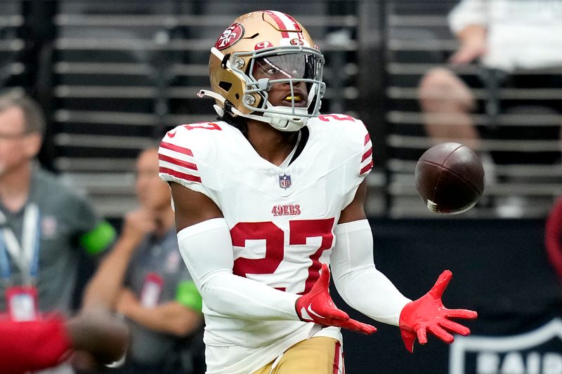 San Francisco 49ers safety Ji'Ayir Brown (27) warms up prior to an NFL preseason football game against the Las Vegas Raiders, Sunday, Aug. 13, 2023, in Las Vegas. (AP Photo/John Locher)