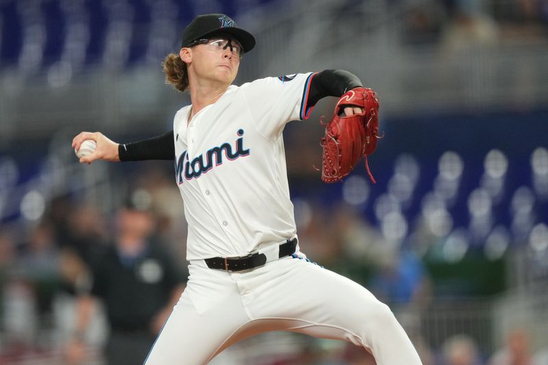 Aug 6, 2024; Miami, Florida, USA;  Miami Marlins starting pitcher Max Meyer (23) pitches against the Cincinnati Reds in the first inning at loanDepot Park. Mandatory Credit: Jim Rassol-USA TODAY Sports