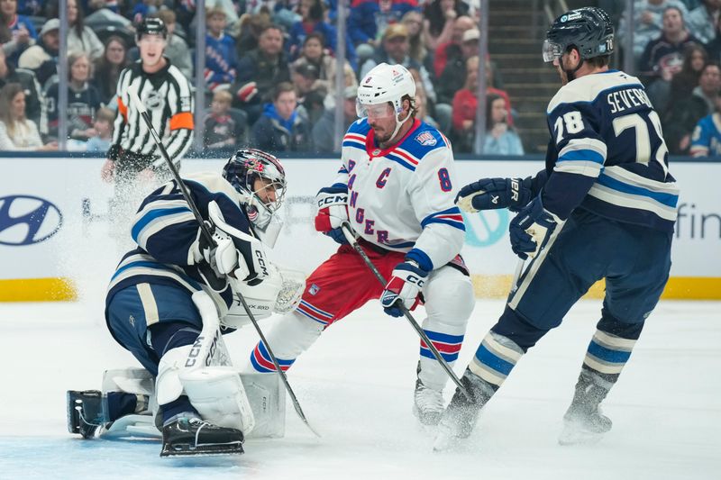 Nov 15, 2025; Columbus, Ohio, USA;  Columbus Blue Jackets goaltender Jet Greaves (73) makes a save in net against New York Rangers center J.T. Miller (8) in the first period at Nationwide Arena. Mandatory Credit: Aaron Doster-Imagn Images