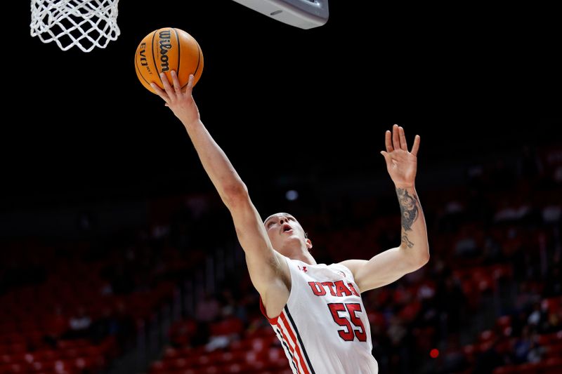 Dec 13, 2022; Salt Lake City, Utah, USA; Utah Utes guard Gabe Madsen (55) drives to the hoop against the Texas-San Antonio Roadrunners in the second half at Jon M. Huntsman Center. Mandatory Credit: Jeffrey Swinger-USA TODAY Sports