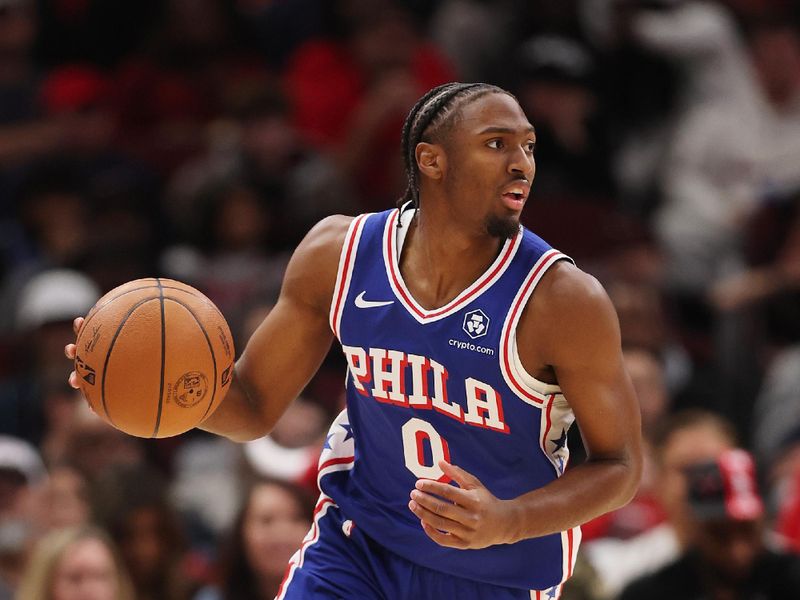 CHICAGO, ILLINOIS - DECEMBER 08: Tyrese Maxey #0 of the Philadelphia 76ers dribbles up the court against the Chicago Bulls during the first half at the United Center on December 08, 2024 in Chicago, Illinois. NOTE TO USER: User expressly acknowledges and agrees that, by downloading and or using this photograph, User is consenting to the terms and conditions of the Getty Images License Agreement.  (Photo by Michael Reaves/Getty Images)