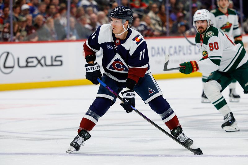 Feb 26, 2026; Denver, Colorado, USA; Colorado Avalanche center Parker Kelly (17) controls the puck in the first period against the Minnesota Wild at Ball Arena. Mandatory Credit: Isaiah J. Downing-Imagn Images