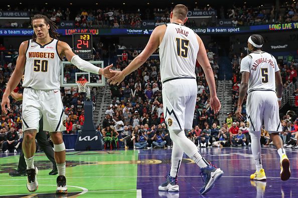 NEW ORLEANS, LA - NOVEMBER 17: Nikola Jokic #15 and Aaron Gordon #50 of the Denver Nuggets high five during the game against the New Orleans Pelicans during the In-Season Tournament on November 17, 2023 at the Smoothie King Center in New Orleans, Louisiana. NOTE TO USER: User expressly acknowledges and agrees that, by downloading and or using this Photograph, user is consenting to the terms and conditions of the Getty Images License Agreement. Mandatory Copyright Notice: Copyright 2023 NBAE (Photo by Layne Murdoch Jr./NBAE via Getty Images)