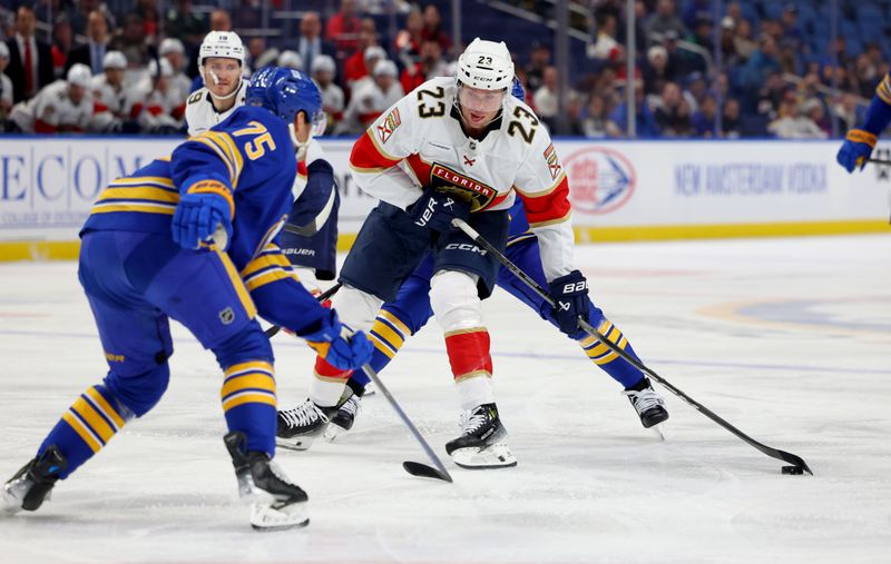 Oct 28, 2024; Buffalo, New York, USA;  Buffalo Sabres defenseman Connor Clifton (75) looks to block a shot by Florida Panthers center Carter Verhaeghe (23) during the first period at KeyBank Center. Mandatory Credit: Timothy T. Ludwig-Imagn Images