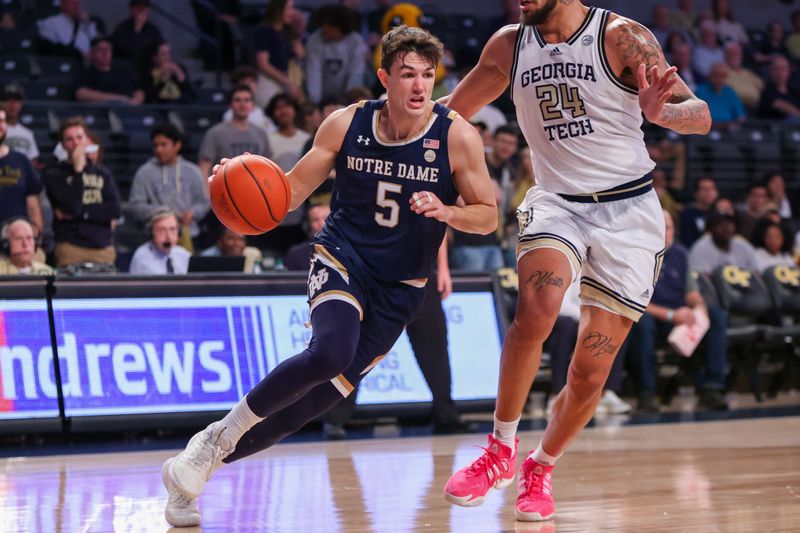 Feb 8, 2023; Atlanta, Georgia, USA; Notre Dame Fighting Irish guard Cormac Ryan (5) drives on Georgia Tech Yellow Jackets center Rodney Howard (24) in the first half at McCamish Pavilion. Mandatory Credit: Brett Davis-USA TODAY Sports