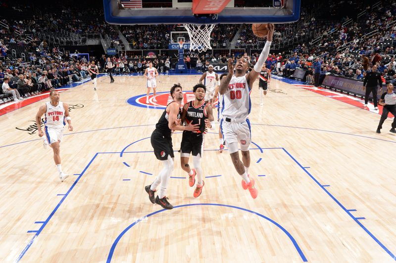 DETROIT, MI - JANUARY 06:  Ron Holland II #00 of the Detroit Pistons shoots the ball during the game against the Portland Trail Blazers on January 06, 2025 at Little Caesars Arena in Detroit, Michigan. NOTE TO USER: User expressly acknowledges and agrees that, by downloading and/or using this photograph, User is consenting to the terms and conditions of the Getty Images License Agreement. Mandatory Copyright Notice: Copyright 2025 NBAE (Photo by Chris Schwegler/NBAE via Getty Images)