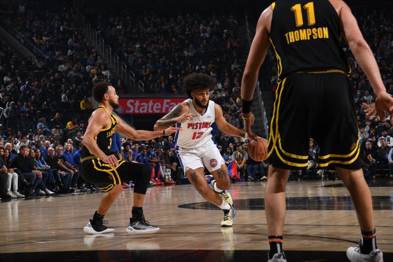 SAN FRANCISCO, CA - JANUARY 5: Isaiah Livers #12 of the Detroit Pistons dribbles the ball during the game against the Golden State Warriors on January 5, 2024 at Chase Center in San Francisco, California. NOTE TO USER: User expressly acknowledges and agrees that, by downloading and or using this photograph, user is consenting to the terms and conditions of Getty Images License Agreement. Mandatory Copyright Notice: Copyright 2024 NBAE (Photo by Noah Graham/NBAE via Getty Images)