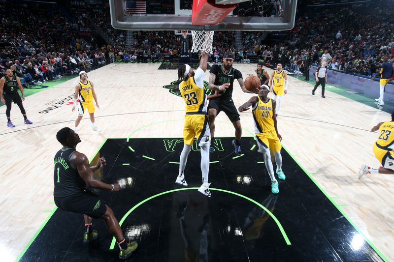 NEW ORLEANS, LA - MARCH 1:  Brandon Ingram #14 of the New Orleans Pelicans grabs a rebound during the game against the Indiana Pacers on March 1, 2024 at the Smoothie King Center in New Orleans, Louisiana. NOTE TO USER: User expressly acknowledges and agrees that, by downloading and or using this Photograph, user is consenting to the terms and conditions of the Getty Images License Agreement. Mandatory Copyright Notice: Copyright 2024 NBAE (Photo by Layne Murdoch Jr./NBAE via Getty Images)