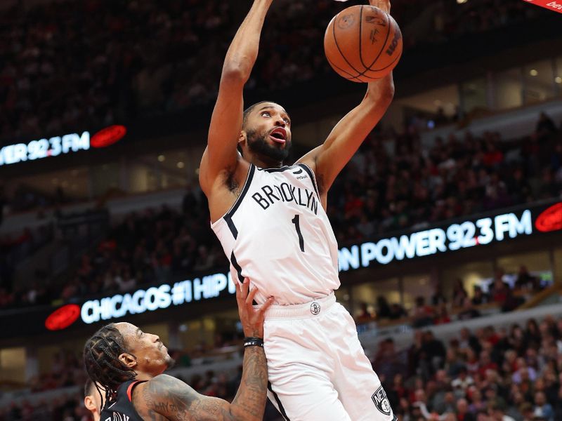 CHICAGO, ILLINOIS - NOVEMBER 03: Mikal Bridges #1 of the Brooklyn Nets dunks against the Chicago Bulls in the second half of the NBA In-Season Tournament at the United Center on November 03, 2023 in Chicago, Illinois. NOTE TO USER: User expressly acknowledges and agrees that, by downloading and or using this photograph, User is consenting to the terms and conditions of the Getty Images License Agreement. (Photo by Michael Reaves/Getty Images)