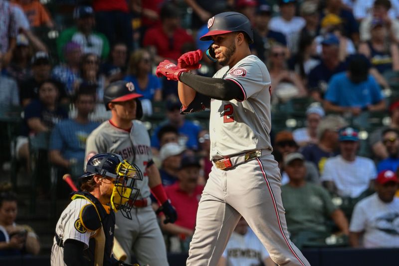 Jul 13, 2024; Milwaukee, Wisconsin, USA; Washington Nationals second baseman Luis Garcia (2) reacts after hitting a solo home run in the seventh inning against the Milwaukee Brewers at American Family Field. Mandatory Credit: Benny Sieu-USA TODAY Sports