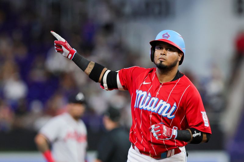 Sep 16, 2023; Miami, Florida, USA; Miami Marlins second baseman Luis Arraez (3) circles the bases after hitting a home run against the Atlanta Braves during the first inning at loanDepot Park. Mandatory Credit: Sam Navarro-USA TODAY Sports