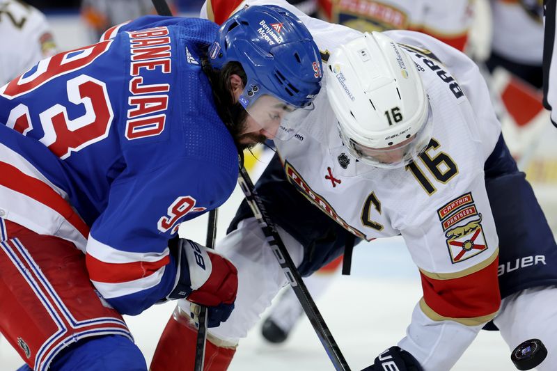 May 22, 2024; New York, New York, USA; New York Rangers center Mika Zibanejad (93) and Florida Panthers center Aleksander Barkov (16) fight for a face off during the third period of game one of the Eastern Conference Final of the 2024 Stanley Cup Playoffs at Madison Square Garden. Mandatory Credit: Brad Penner-USA TODAY Sports