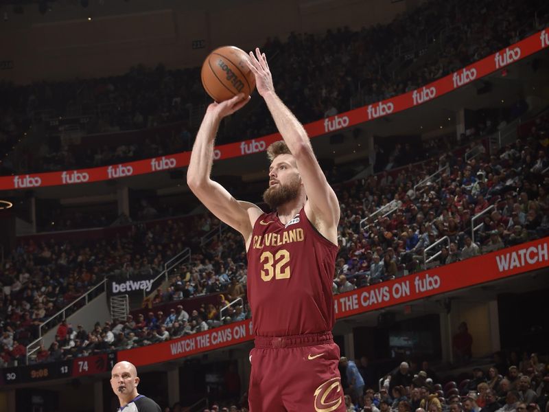 CLEVELAND, OH - JANUARY 9: Dean Wade #32 of the Cleveland Cavaliers shoots a three point basket during the game against the Toronto Raptors on January 9, 2025 at Rocket Mortgage FieldHouse in Cleveland, Ohio. NOTE TO USER: User expressly acknowledges and agrees that, by downloading and/or using this Photograph, user is consenting to the terms and conditions of the Getty Images License Agreement. Mandatory Copyright Notice: Copyright 2025 NBAE (Photo by David Liam Kyle/NBAE via Getty Images)