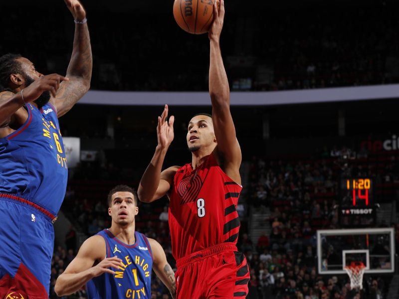 PORTLAND, OR - MARCH 23: Kris Murray #8 of the Portland Trail Blazers drives to the basket during the game against the Denver Nuggets on March 23, 2024 at the Moda Center Arena in Portland, Oregon. NOTE TO USER: User expressly acknowledges and agrees that, by downloading and or using this photograph, user is consenting to the terms and conditions of the Getty Images License Agreement. Mandatory Copyright Notice: Copyright 2024 NBAE (Photo by Cameron Browne/NBAE via Getty Images)