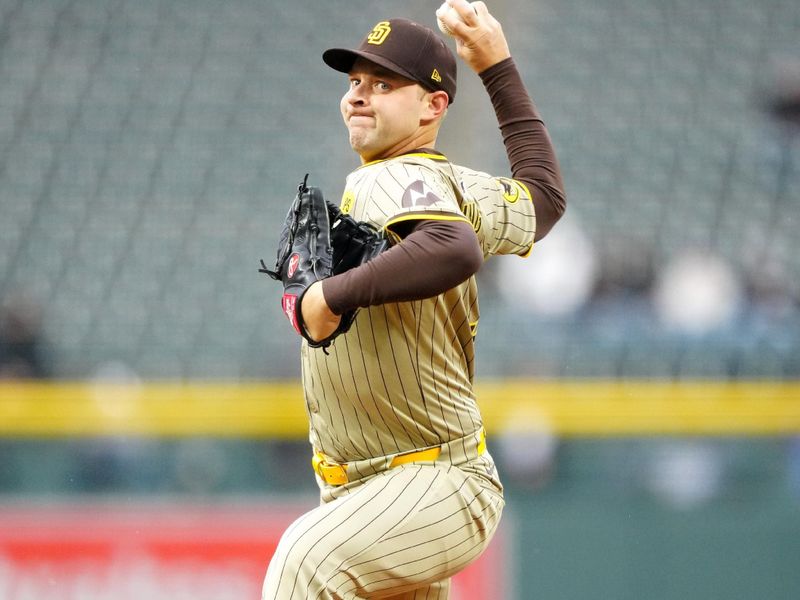 Apr 23, 2024; Denver, Colorado, USA; San Diego Padres pitcher Michael King (34) delivers a pitch in the first inning against the Colorado Rockies at Coors Field. Mandatory Credit: Ron Chenoy-USA TODAY Sports