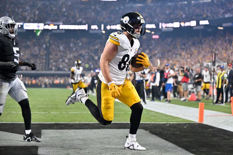 Pittsburgh Steelers tight end Pat Freiermuth makes a touchdown catch during the second half of an NFL football game against the Las Vegas Raiders Sunday, Sept. 24, 2023, in Las Vegas. (AP Photo/David Becker)