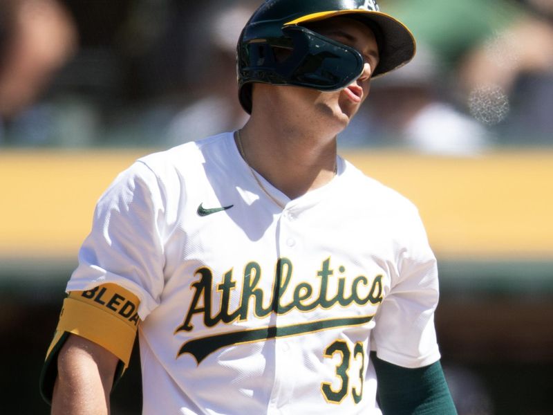 Jun 6, 2024; Oakland, California, USA; Oakland Athletics center fielder JJ Bleday (33) reacts to a called strike during the ninth inning against the Seattle Mariners at Oakland-Alameda County Coliseum. Mandatory Credit: D. Ross Cameron-USA TODAY Sports