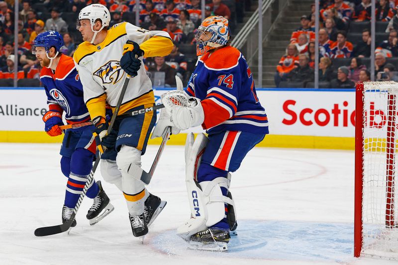Jan 27, 2024; Edmonton, Alberta, CAN; Nashville Predators forward Liam Foudy (18) fights for position in front of Edmonton Oilers goaltender Stuart Skinner (74) during the second period  at Rogers Place. Mandatory Credit: Perry Nelson-USA TODAY Sports