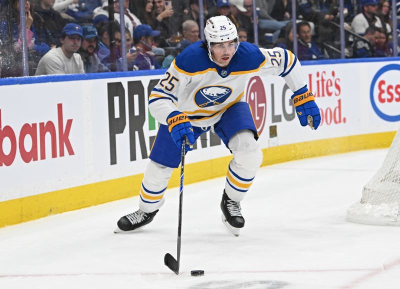 Oct 25, 2025; Toronto, Ontario, CAN; Toronto Maple Leafs defenceman carries the puck against the Toronto Maple Leafs in the third period at Scotiabank Arena. Mandatory Credit: Gerry Angus-Imagn Images