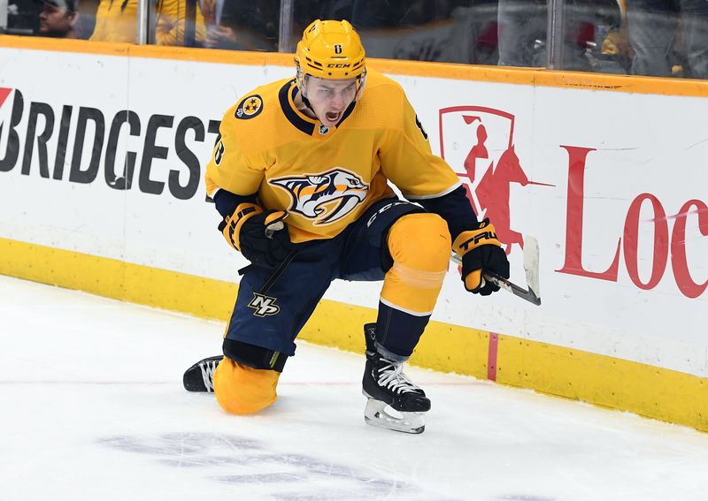 Jan 26, 2023; Nashville, Tennessee, USA; Nashville Predators center Cody Glass (8) celebrates after a goal during the first period against the New Jersey Devils at Bridgestone Arena. Mandatory Credit: Christopher Hanewinckel-USA TODAY Sports