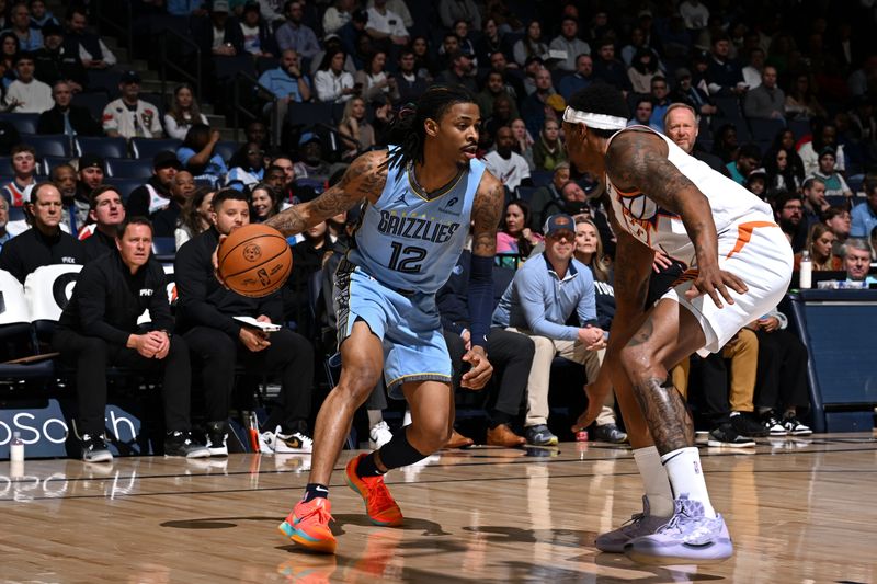 MEMPHIS, TN - FEBRUARY 25: Ja Morant #12 of the Memphis Grizzlies handles the ball during the game against the Phoenix Suns on February 25, 2025 at FedExForum in Memphis, Tennessee. NOTE TO USER: User expressly acknowledges and agrees that, by downloading and or using this photograph, User is consenting to the terms and conditions of the Getty Images License Agreement. Mandatory Copyright Notice: Copyright 2025 NBAE(Photo by Grant Burke/NBAE via Getty Images)