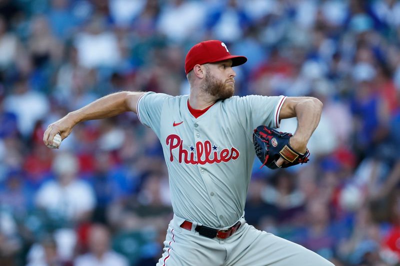 Jul 3, 2024; Chicago, Illinois, USA; Philadelphia Phillies starting pitcher Zack Wheeler (45) delivers a pitch against the Chicago Cubs during the second inning at Wrigley Field. Mandatory Credit: Kamil Krzaczynski-USA TODAY Sports