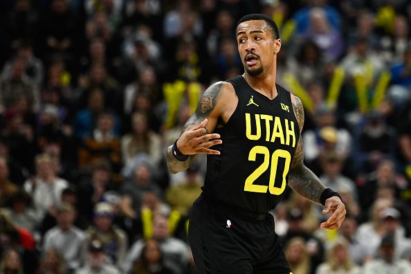 SALT LAKE CITY, UTAH - JANUARY 01: John Collins #20 of the Utah Jazz celebrates a three point shot during the first half of a game against the Dallas Mavericks at Delta Center on January 01, 2024 in Salt Lake City, Utah. NOTE TO USER: User expressly acknowledges and agrees that, by downloading and or using this photograph, User is consenting to the terms and conditions of the Getty Images License Agreement. (Photo by Alex Goodlett/Getty Images)