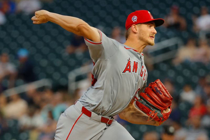 Sep 11, 2024; Minneapolis, Minnesota, USA; Los Angeles Angels starting pitcher Jack Kochanowicz (64) throws to the Minnesota Twins in the fifth inning at Target Field. Mandatory Credit: Bruce Kluckhohn-Imagn Images