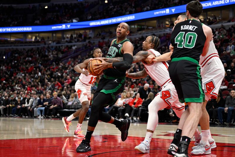 CHICAGO, ILLINOIS - MARCH 23: DeMar DeRozan #11 of the Chicago Bulls knocks the ball aways from Al Horford #42 of the Boston Celtics in the first half at the United Center on March 23, 2024 in Chicago, Illinois.   NOTE TO USER: User expressly acknowledges and agrees that, by downloading and or using this photograph, User is consenting to the terms and conditions of the Getty Images License Agreement.  (Photo by Quinn Harris/Getty Images)